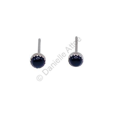 Sterling silver earrings with small round balck stones on posts.