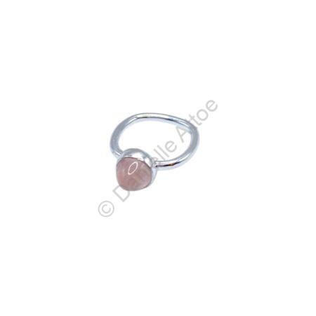 Silver ring with a hammered square shank and rose quartz bullet cabochon